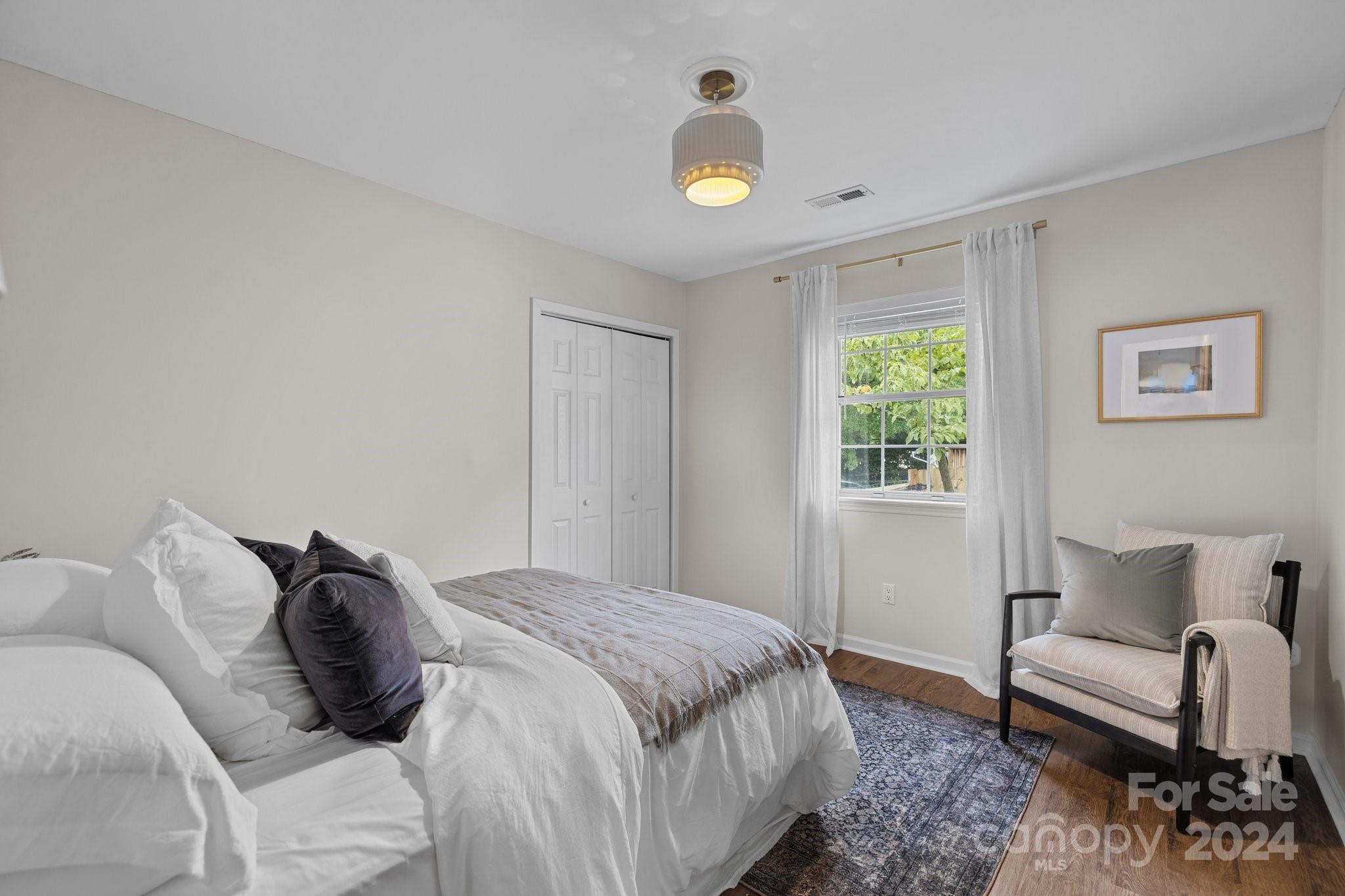 10527 Fairway Ridge Road Charlotte, NC 28277 - Photo 30 of 45 a bedroom with bed and a window