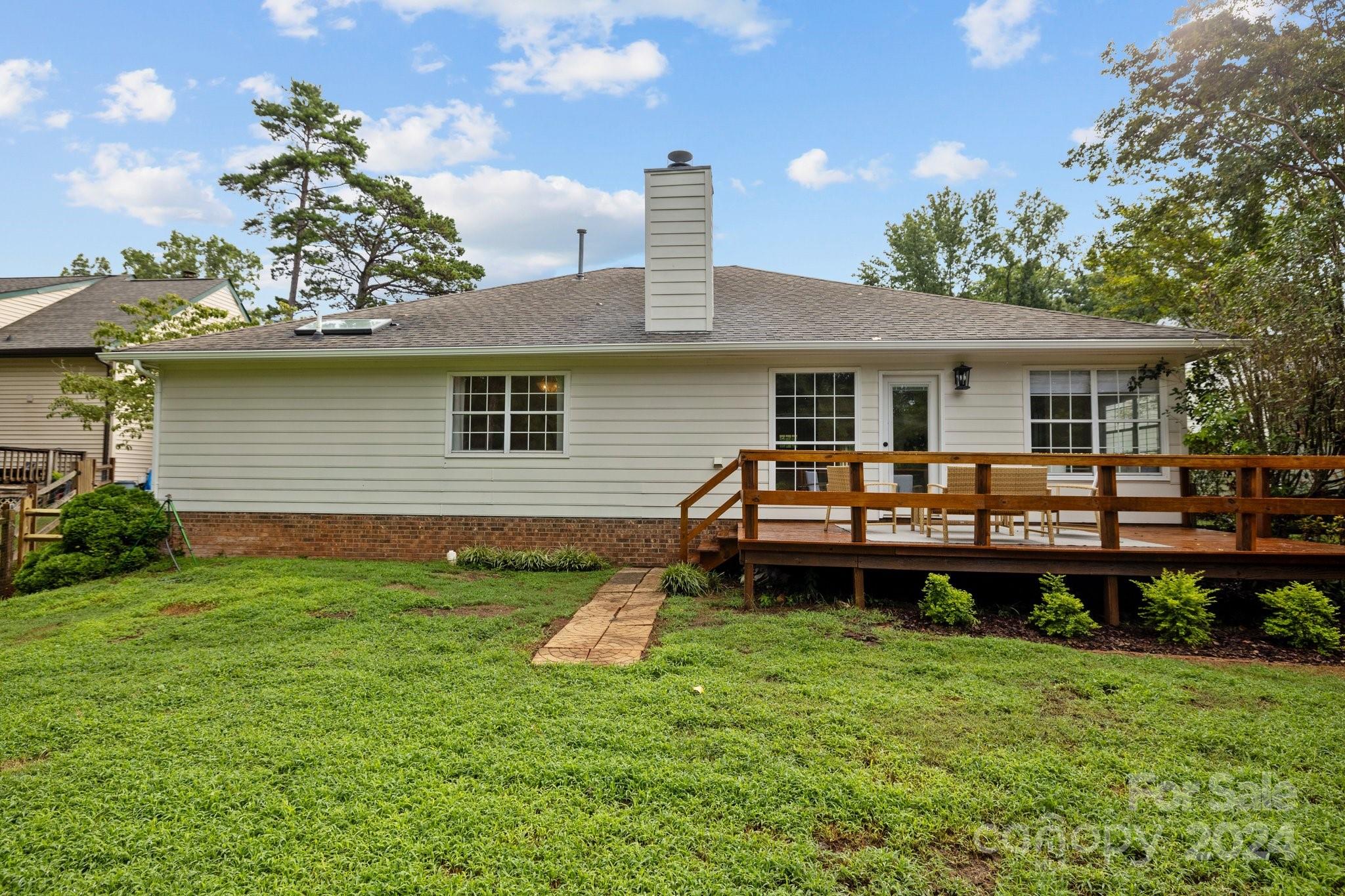 10527 Fairway Ridge Road Charlotte, NC 28277 - Photo 40 of 45 a house view with a garden space