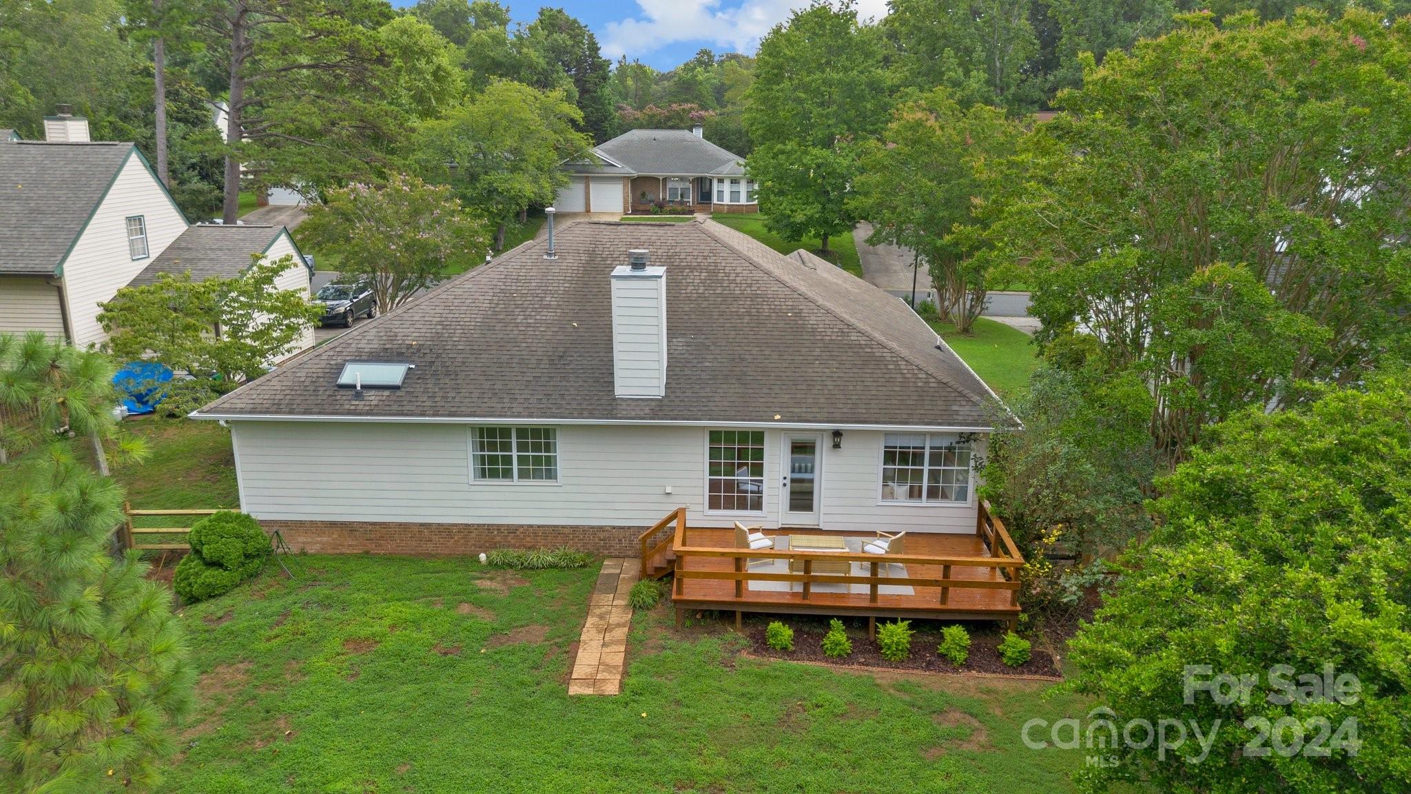 10527 Fairway Ridge Road Charlotte, NC 28277 - Photo 43 of 45 a aerial view of a house with a yard and sitting area
