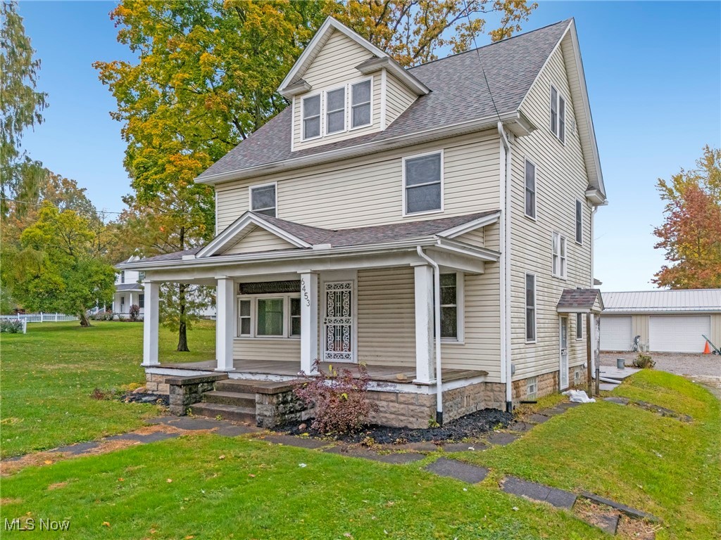 6453 Waterloo Road Atwater, OH 44201 - Photo 1 of 24 View of front of home featuring a front lawn, a porch, and a shingled roof