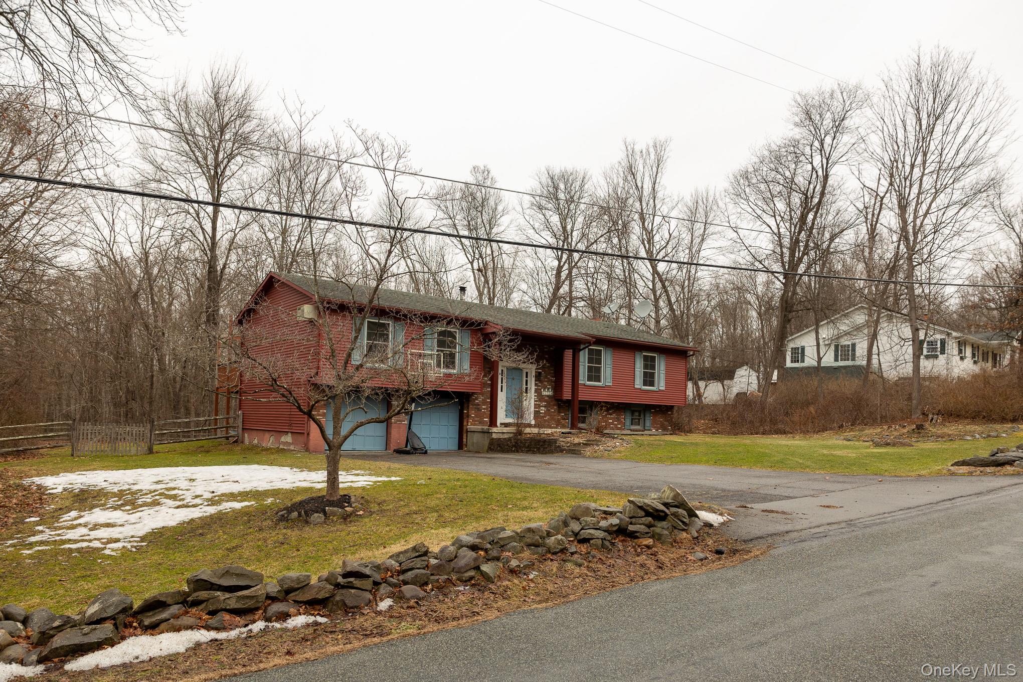 172 Farmingdale Road Blooming Grove, NY 10918 - Photo 2 of 44 a view of a water fountain in front of a house