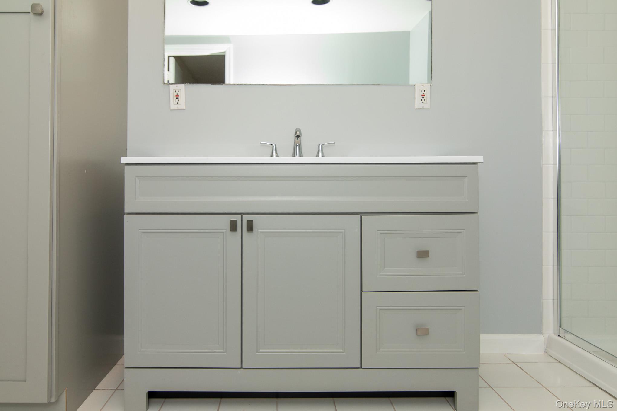 172 Farmingdale Road Blooming Grove, NY 10918 - Photo 33 of 44 a bathroom with a sink and a mirror