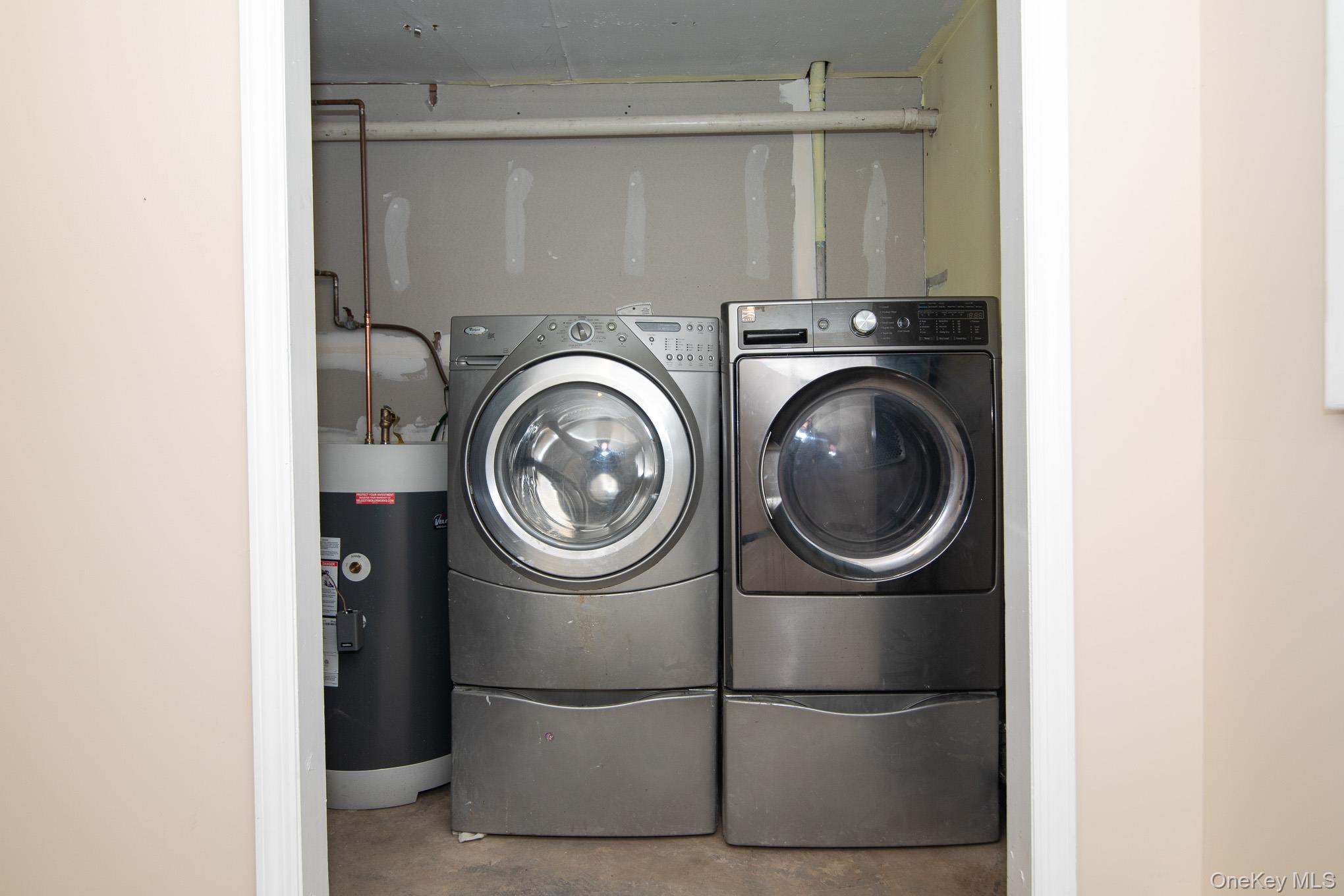 172 Farmingdale Road Blooming Grove, NY 10918 - Photo 36 of 44 a utility room with dryer and washer