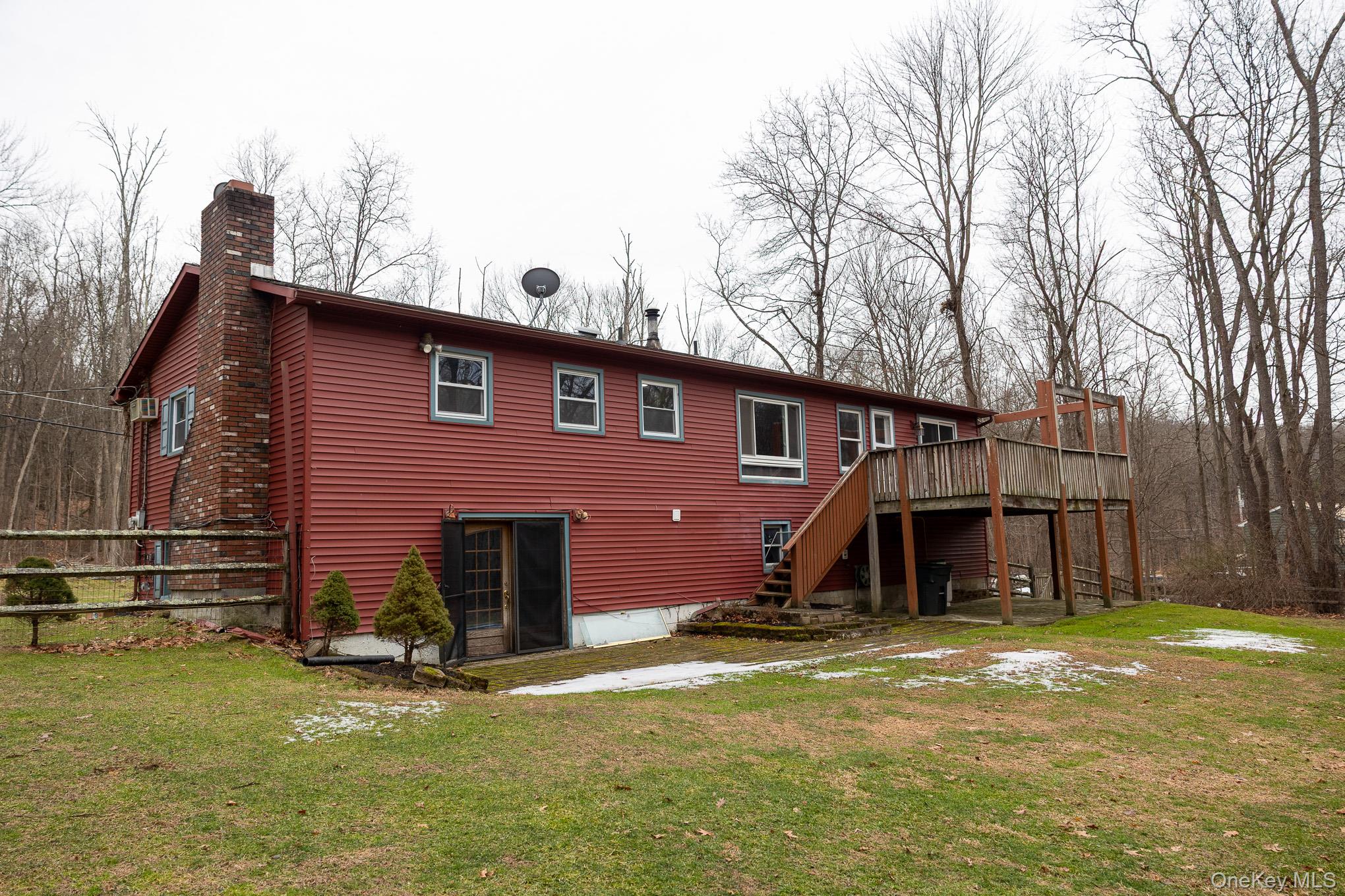 172 Farmingdale Road Blooming Grove, NY 10918 - Photo 37 of 44 a view of a house with a yard