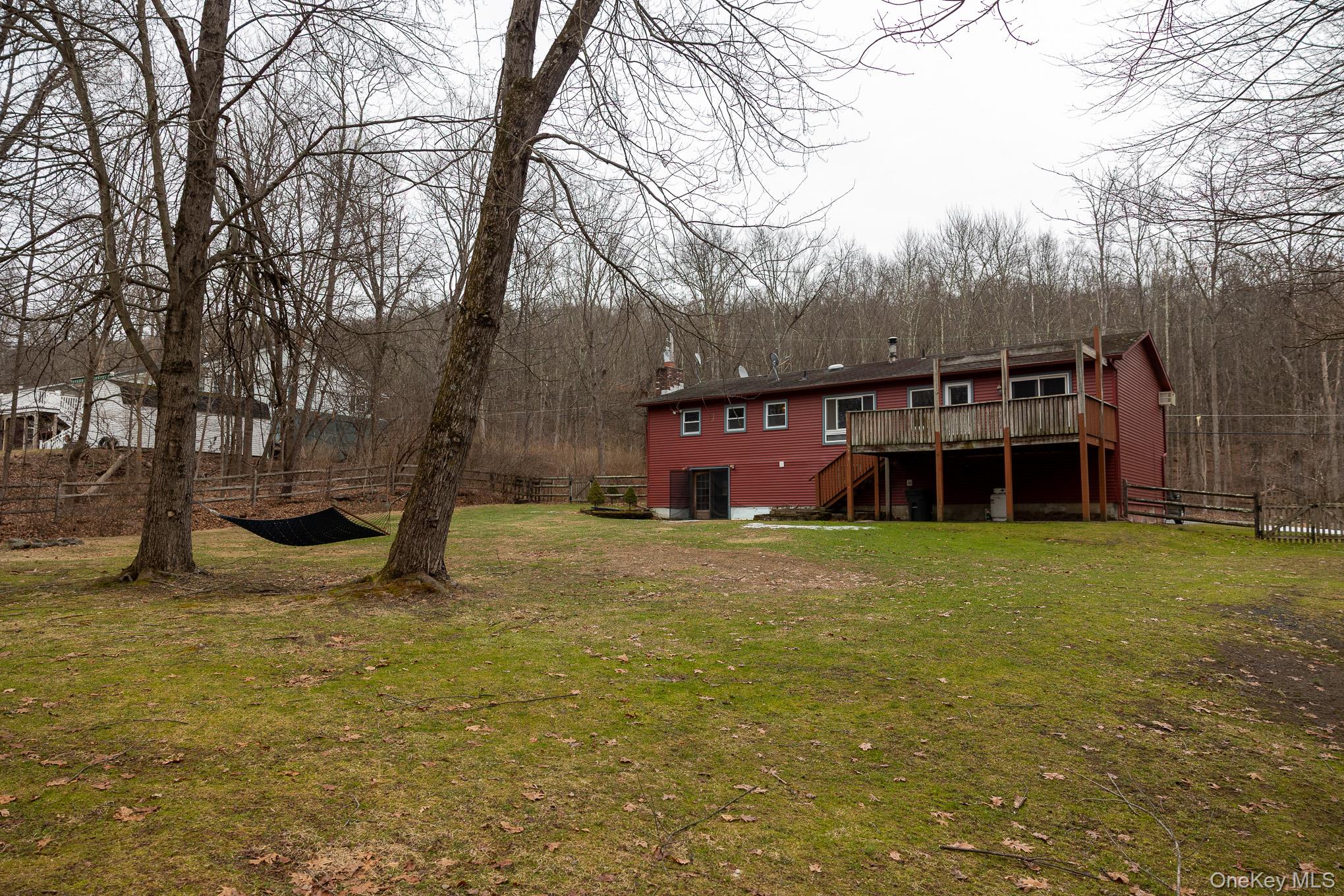 172 Farmingdale Road Blooming Grove, NY 10918 - Photo 38 of 44 a large tree in front of a house