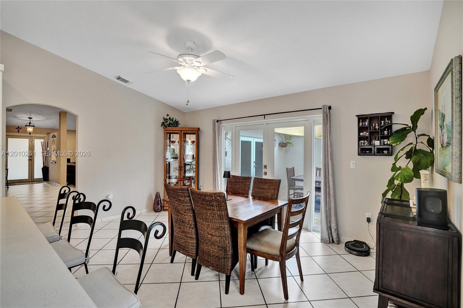 13621 Southwest 18th Street Miramar, FL 33027 - Photo 17 of 45 a dining room with furniture and window