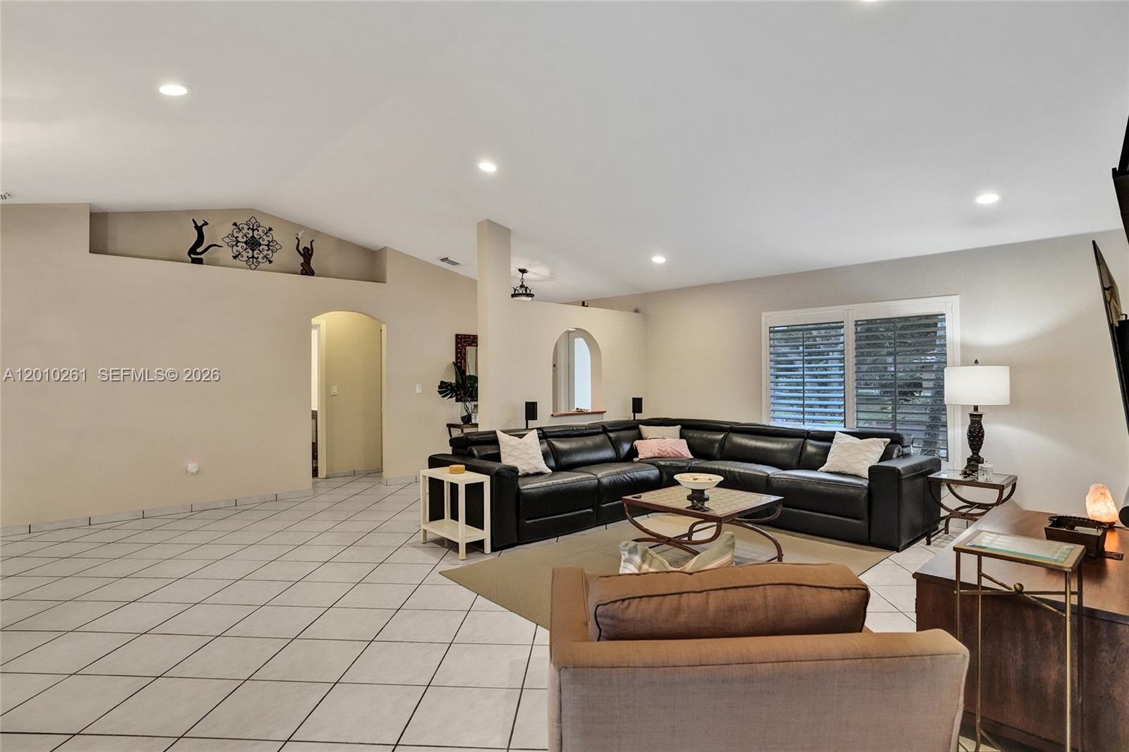 13621 Southwest 18th Street Miramar, FL 33027 - Photo 8 of 45 a living room with furniture