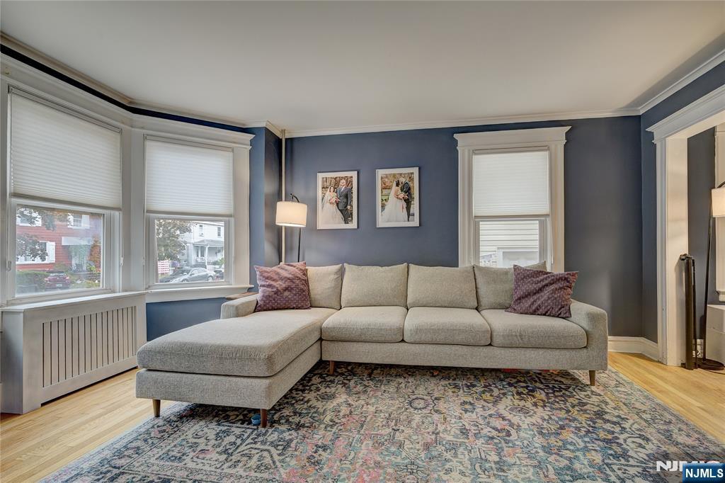 43 Llewellyn Avenue Bloomfield, NJ 07003 - Photo 2 of 25 a living room with furniture and a window