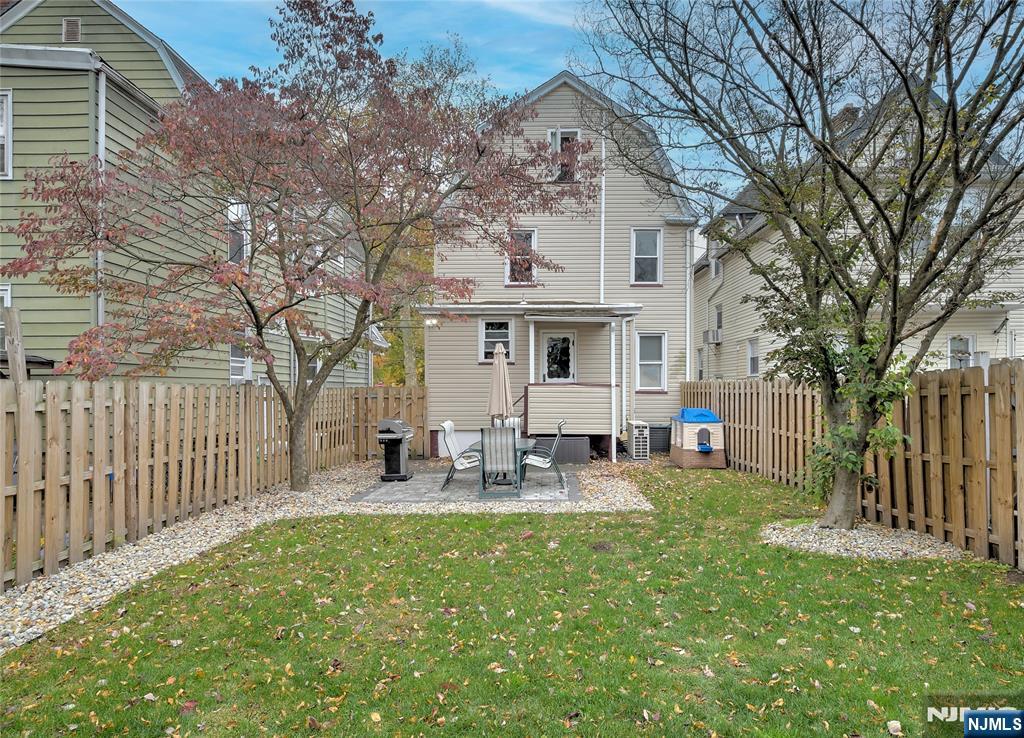 43 Llewellyn Avenue Bloomfield, NJ 07003 - Photo 23 of 25 a front view of house with yard and seating area
