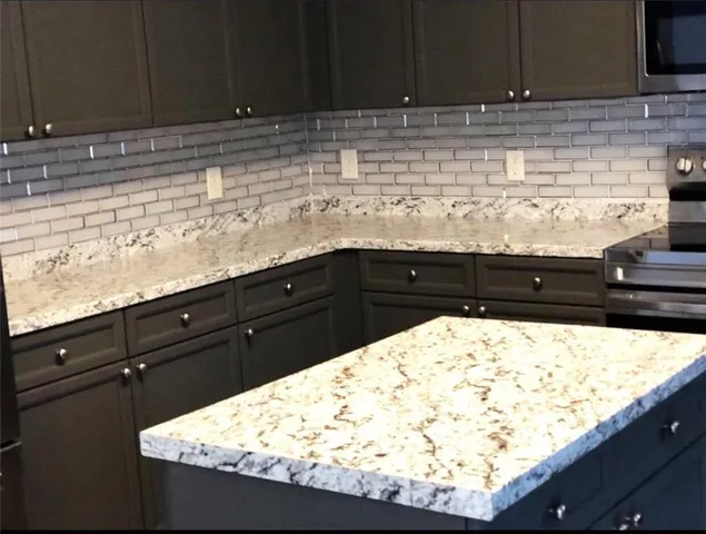 a close view of sink and cabinets