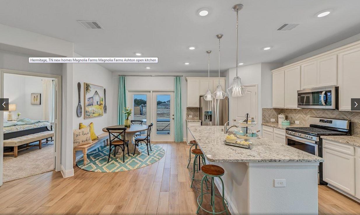 The kitchen and dining room both feature recessed lighting!