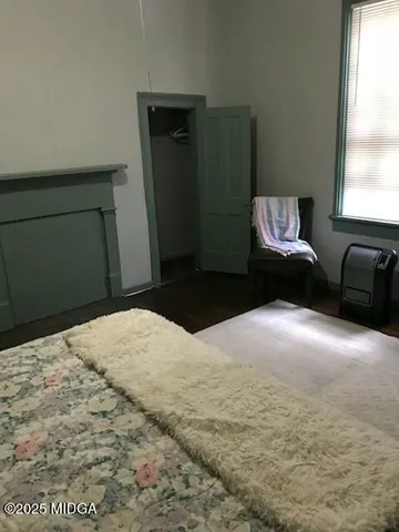 a bathroom with a shower and a sink