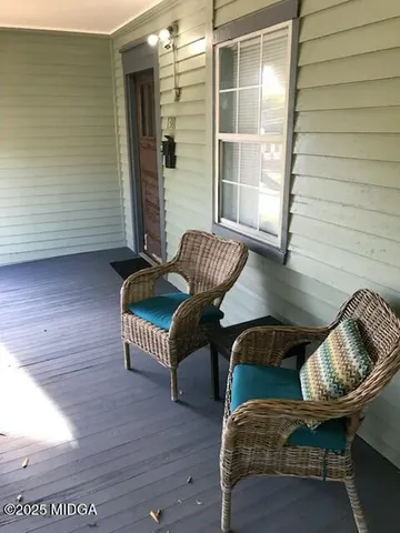 a kitchen with a sink a window and cabinets