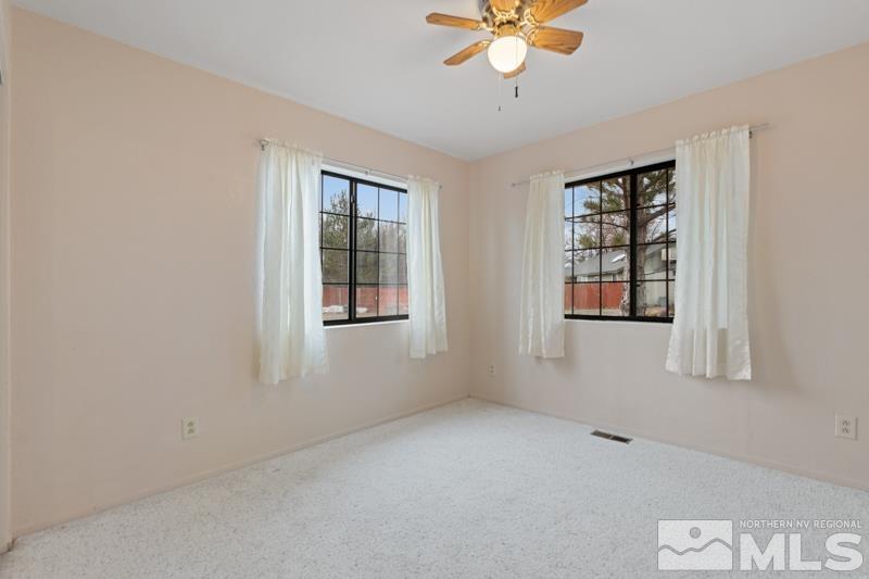 4060 Cimarron Road Fallon, NV 89406 - Photo 15 of 22 a view of an empty room with a window