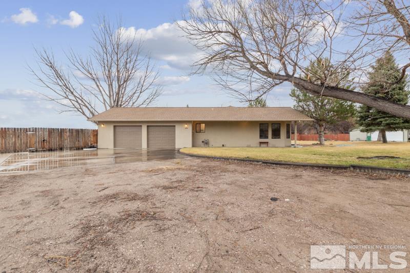 4060 Cimarron Road Fallon, NV 89406 - Photo 22 of 22 a front view of a house with a yard