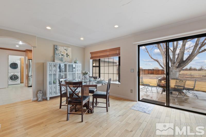 4060 Cimarron Road Fallon, NV 89406 - Photo 4 of 22 a view of a dining room with furniture and wooden floor