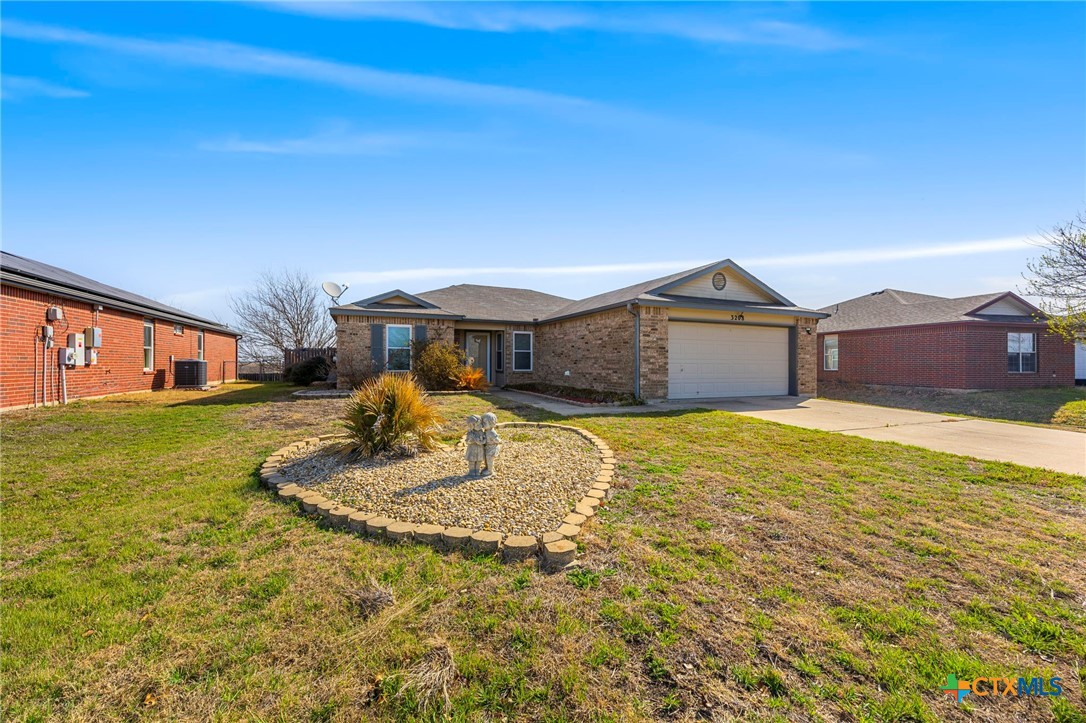 3208 Viewcrest Drive Killeen, TX 76549 - Photo 2 of 15 a front view of a house with a yard