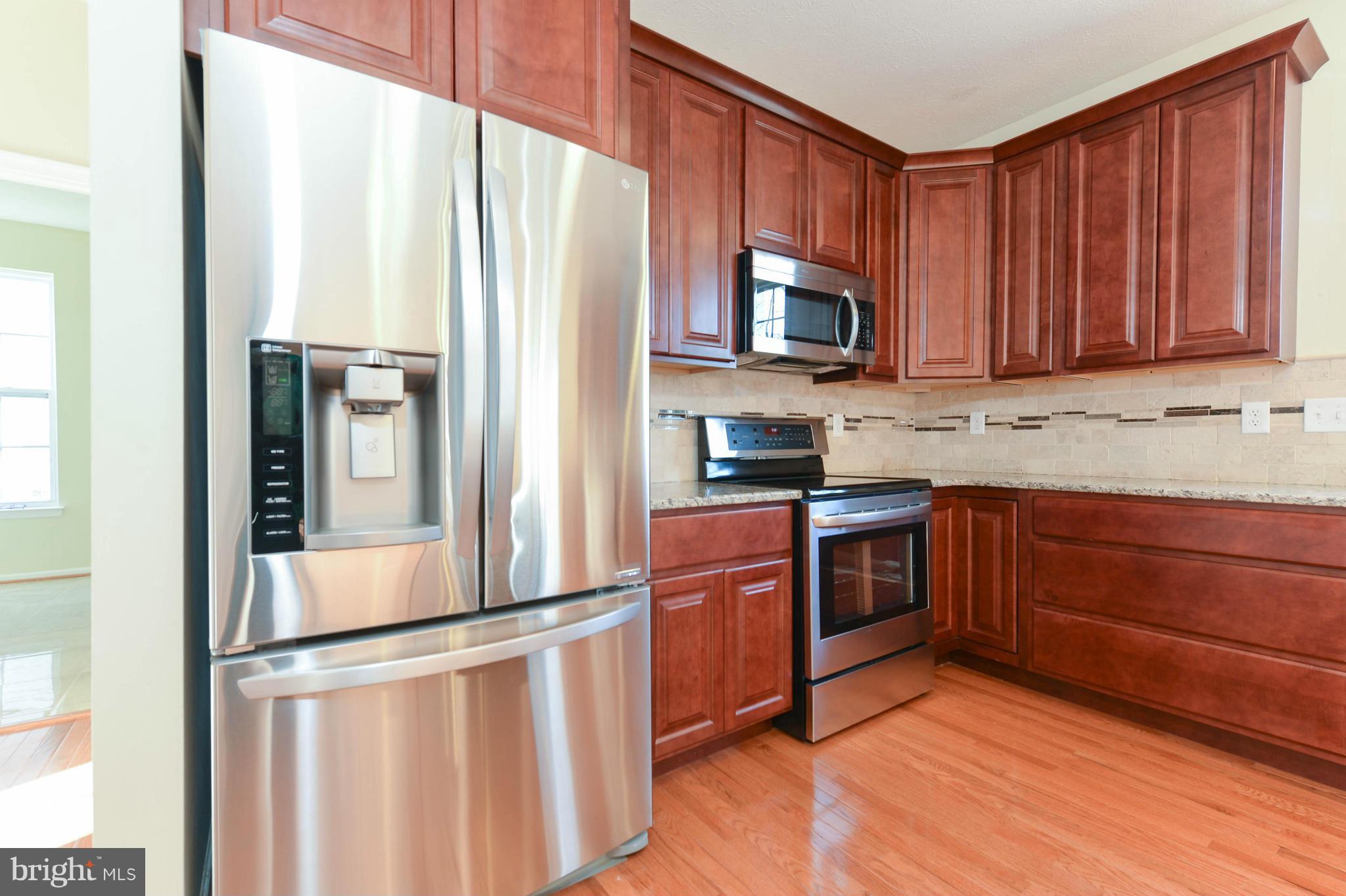 11 Henry Way Elkton, MD 21921 - Photo 7 of 29 shows new stainless appliances