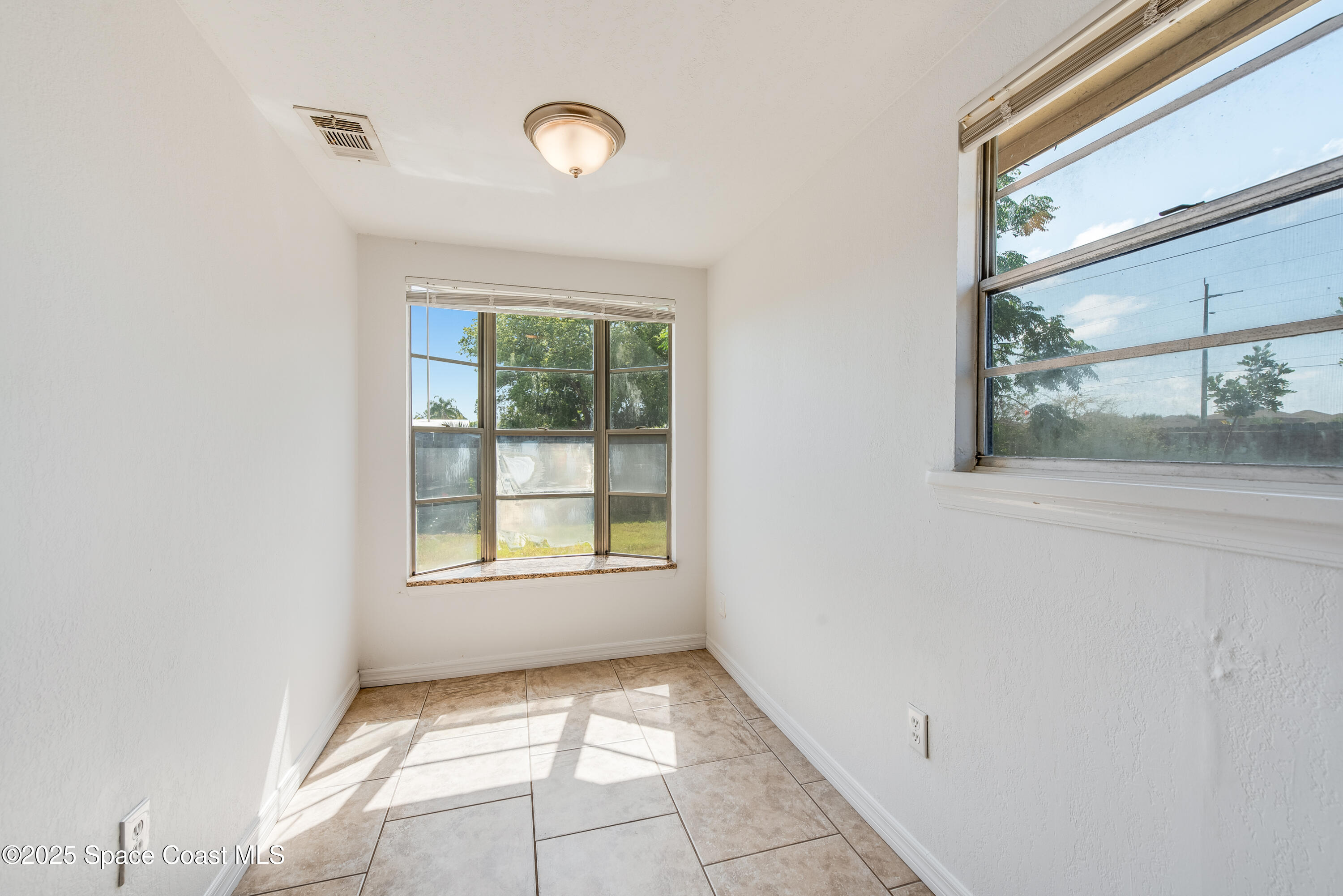 2021 Nottingham Road Melbourne, FL 32935 - Photo 7 of 28 Dining Nook