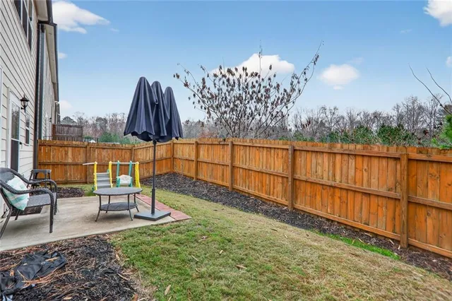 a view of a bench in wooden floor