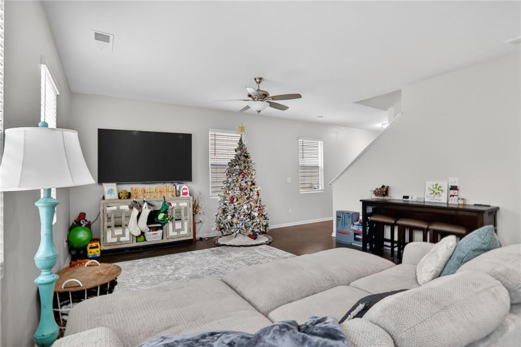 594 Summit Point Canton, GA 30114 - Photo 5 of 32 a living room with furniture and a flat screen tv