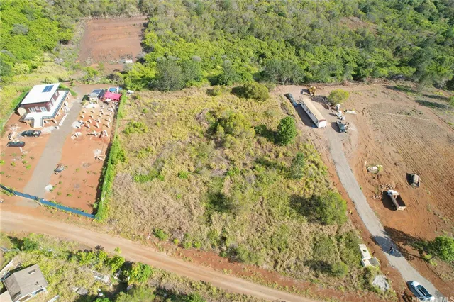 an aerial view of residential house with an outdoor space