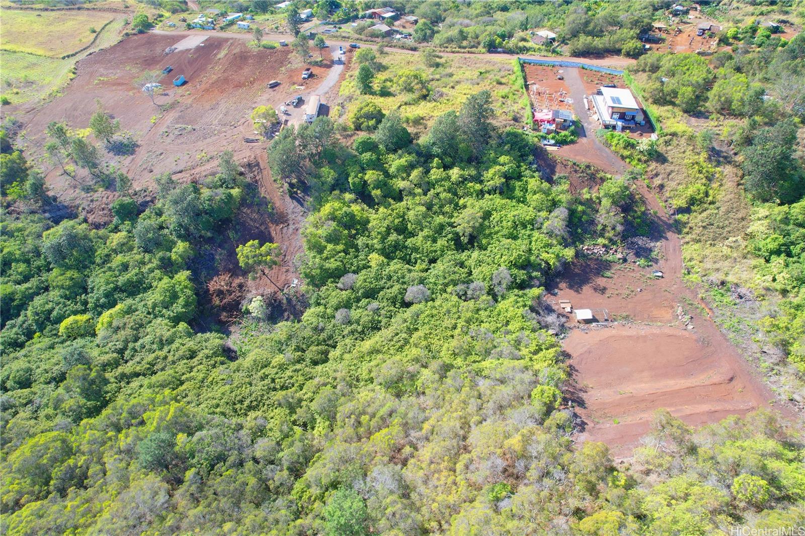 94-1100 Kunia Road, Unit 99C2 Waipahu, HI 96797 - Photo 3 of 7 an aerial view of residential house with outdoor space and trees all around