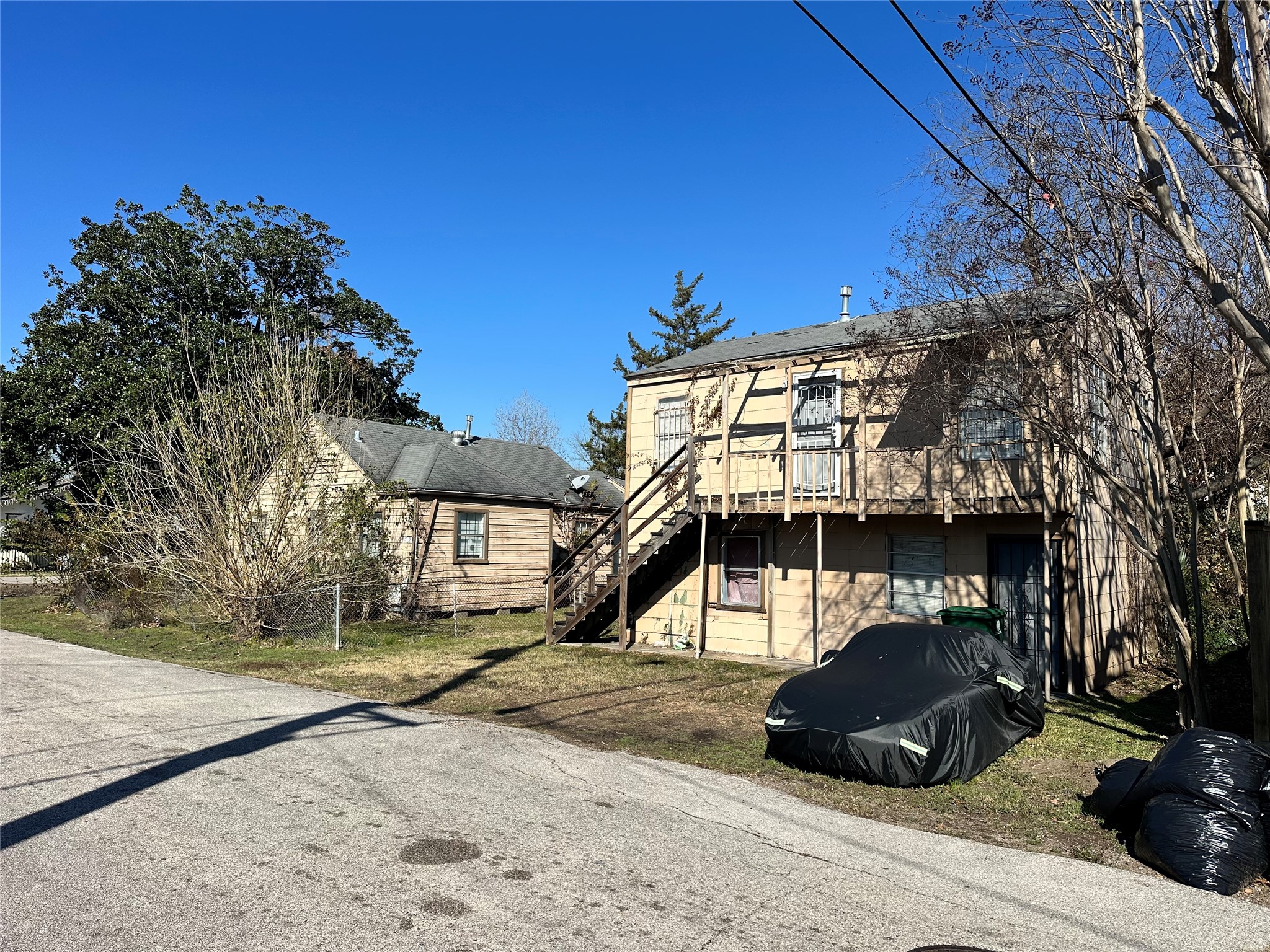 1502 Tabor Street Houston, TX 77009 - Photo 10 of 27 Convenient parking is available directly in front of the apartment units, with additional street parking available for tenants, guests, or visitors.