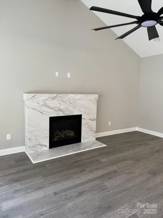 a living room with a fireplace