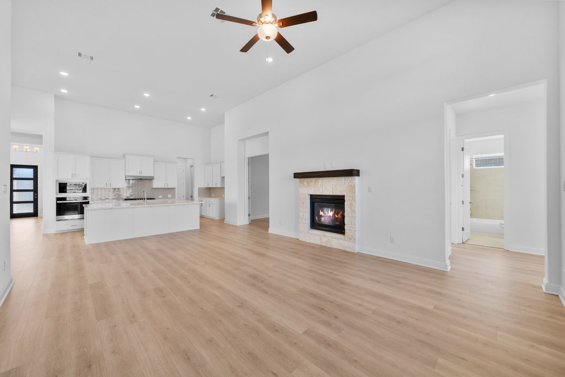 1005 Ellensburg Drive Georgetown, TX 78633 - Photo 14 of 38 From Family Room to Open Concept Kitchen