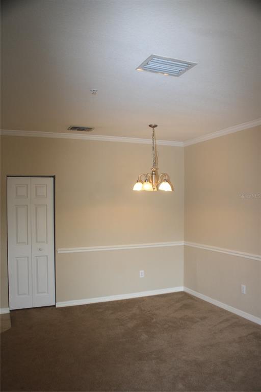 3621 Conroy Road, Unit 739 Orlando, FL 32839 - Photo 5 of 20 a view of an empty room with a window