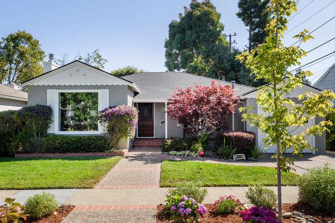 404 Dwight Road Burlingame, CA 94010 - Photo 1 of 33 a front view of a house with garden