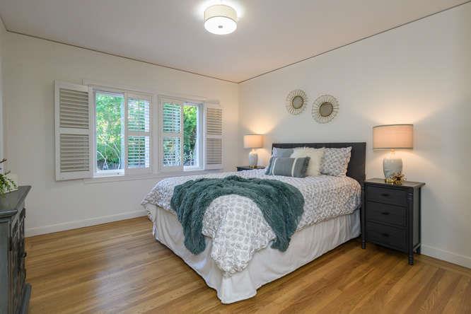 404 Dwight Road Burlingame, CA 94010 - Photo 17 of 33 a bedroom with a bed and a night stand