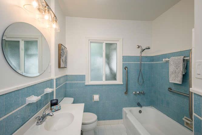 404 Dwight Road Burlingame, CA 94010 - Photo 20 of 33 a bathroom with a sink toilet and shower