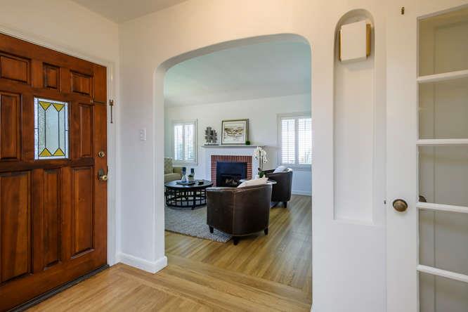 404 Dwight Road Burlingame, CA 94010 - Photo 6 of 33 a living room with furniture and a fireplace