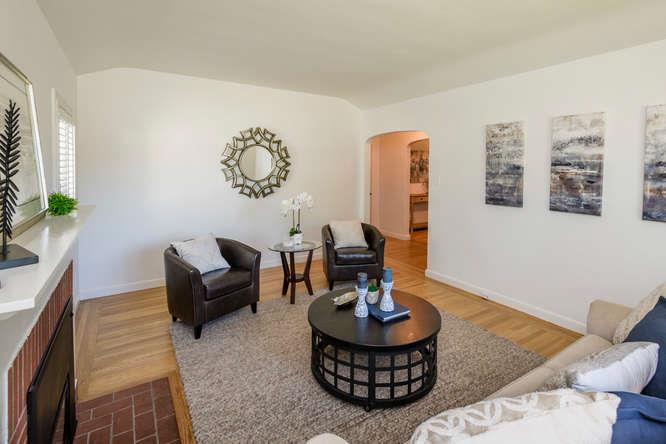 404 Dwight Road Burlingame, CA 94010 - Photo 8 of 33 a living room with furniture and a table