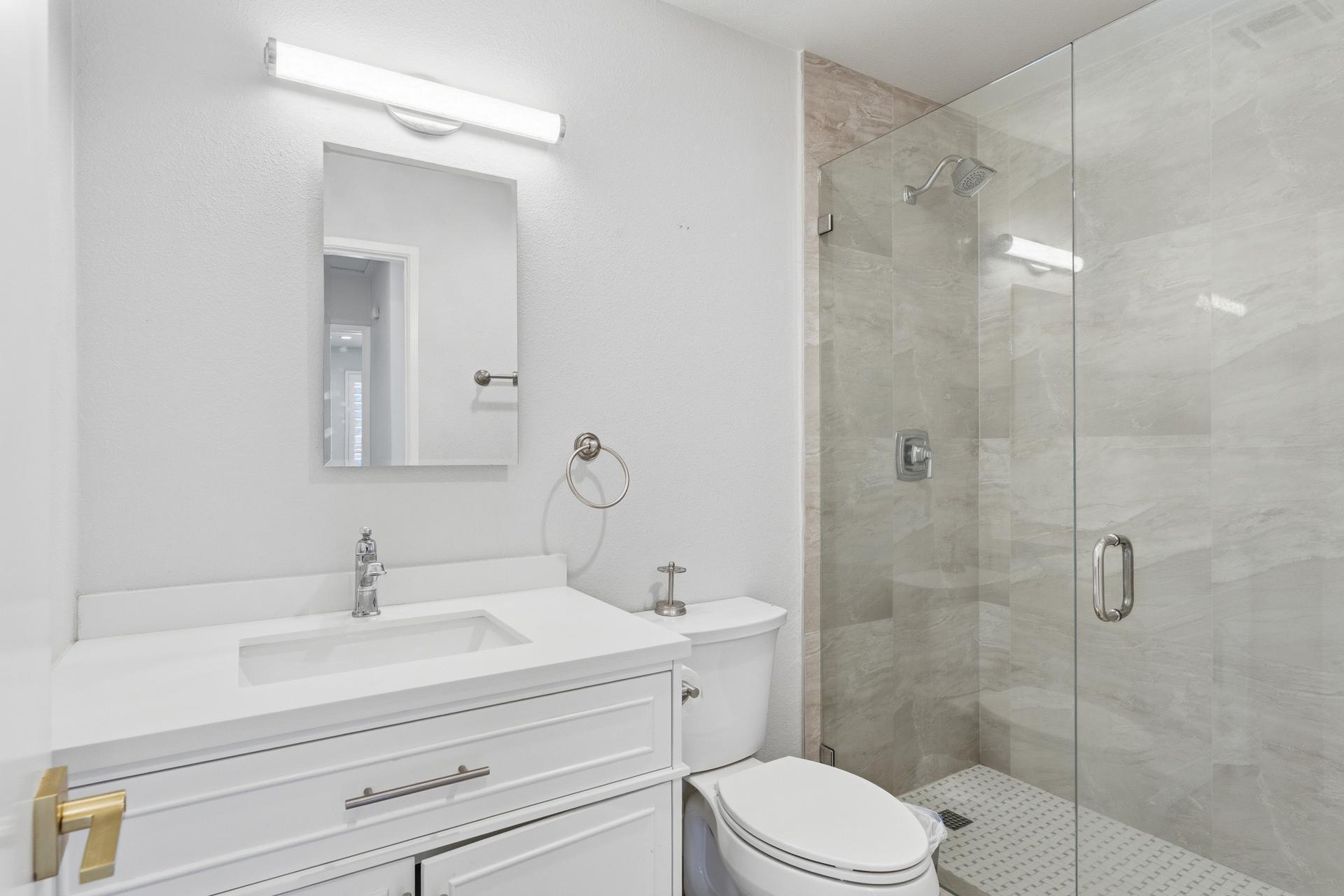 40961 Cecina Way Bermuda Dunes, CA 92203 - Photo 13 of 27 a bathroom with a sink a toilet and shower