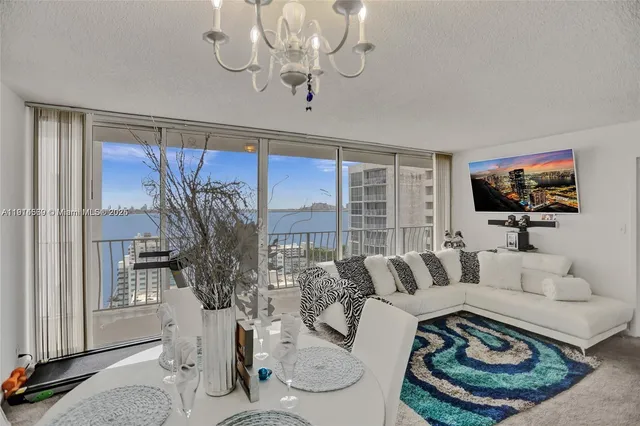 a view of a balcony with an ocean view