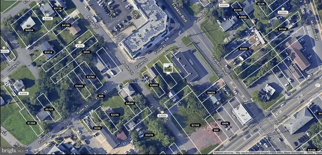 a view of a yard with a street view