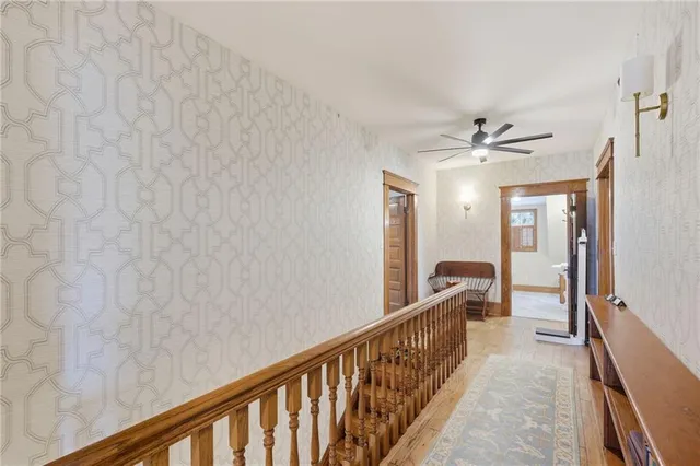 a view of a hallway with a chandelier