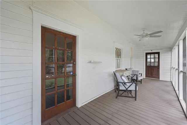 a view of a livingroom with furniture and wooden floor