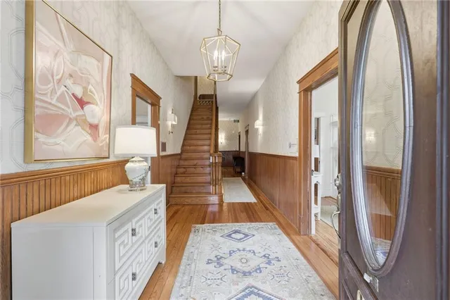 a very nice looking room with wooden floor