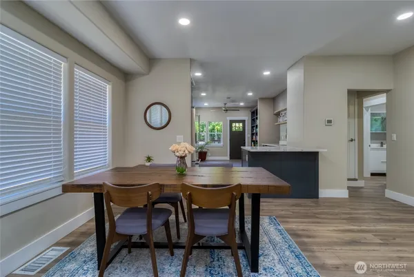 a view of a dining room with furniture