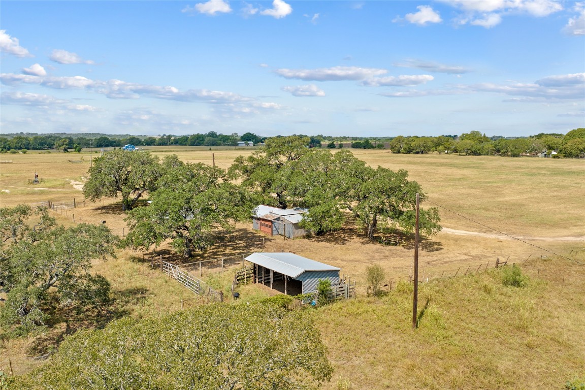 1408 State Park Road Lockhart, TX 78644 - Photo 32 of 38 a view of a lake with houses in the back