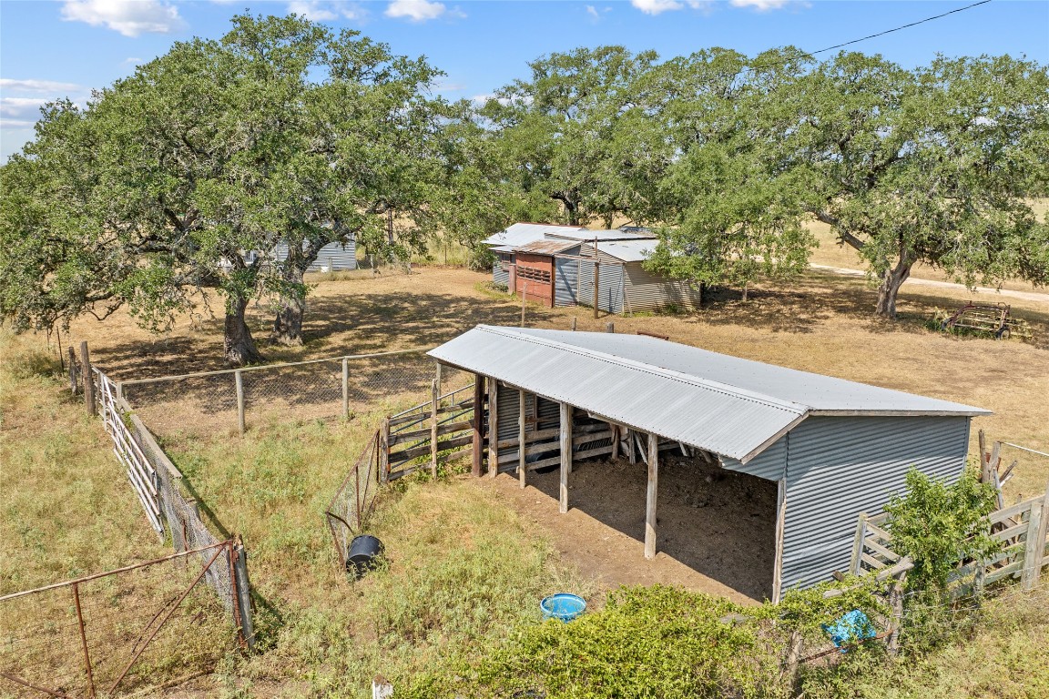 1408 State Park Road Lockhart, TX 78644 - Photo 33 of 38 a view of a patio with chairs and table