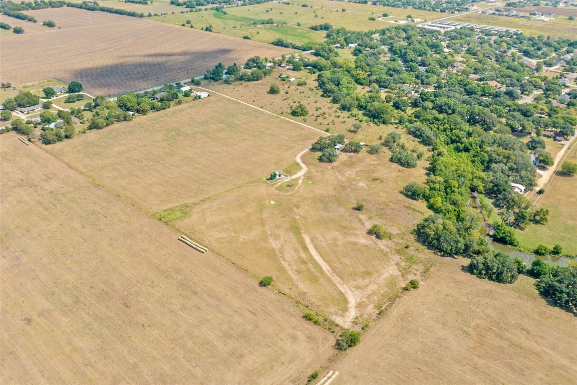 1408 State Park Road Lockhart, TX 78644 - Photo 34 of 38 a view of a yard with trees