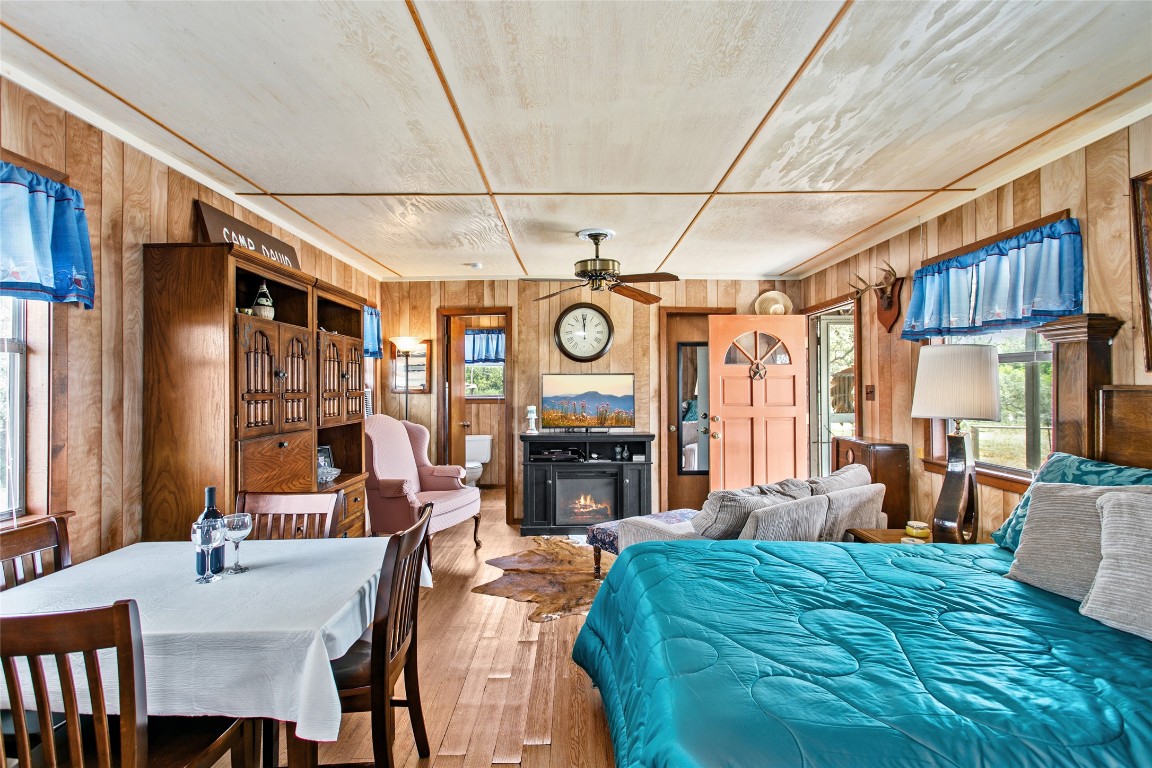 1408 State Park Road Lockhart, TX 78644 - Photo 8 of 38 a bed room with furniture and fireplace