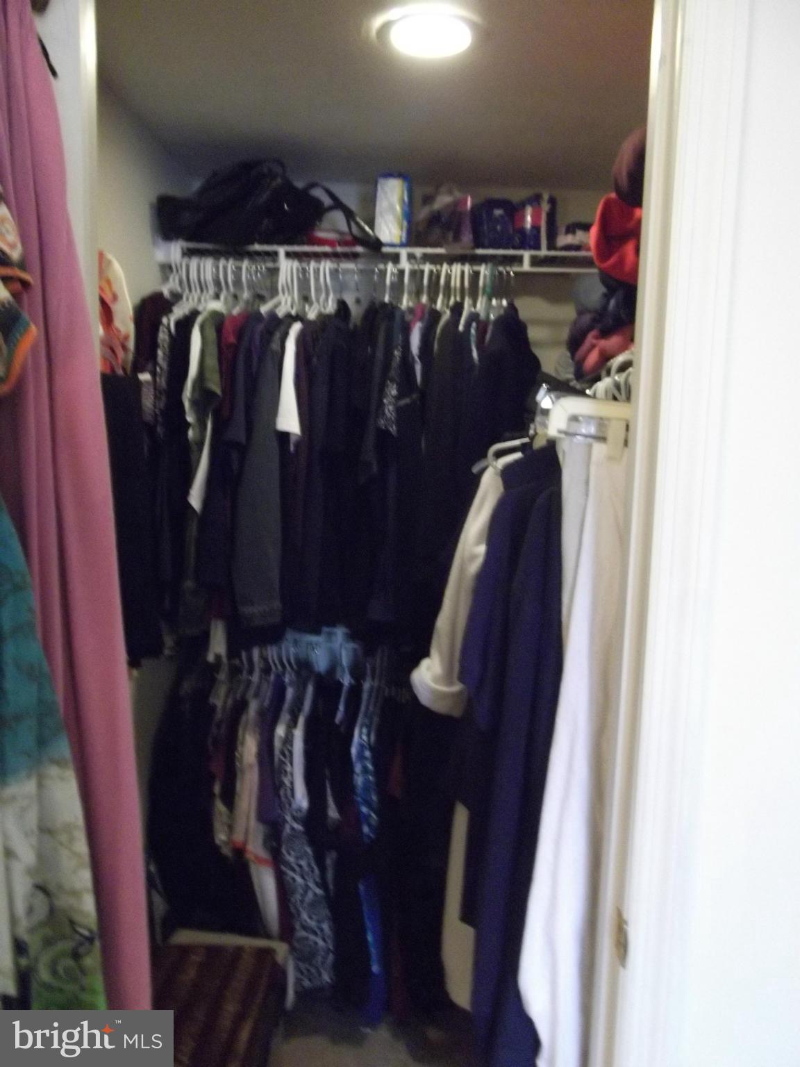 72 Laurel Path Court, Unit 3 Baltimore, MD 21236 - Photo 10 of 18 a view of walk in closet with clothes and shoes