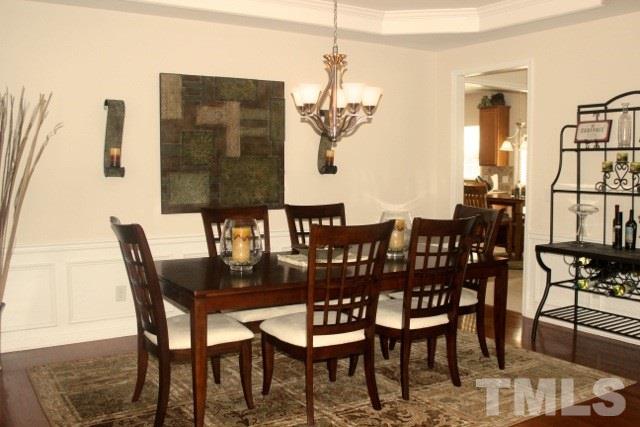 7729 Silver View Lane Raleigh, NC 27613 - Photo 3 of 25 a dining room with furniture and window