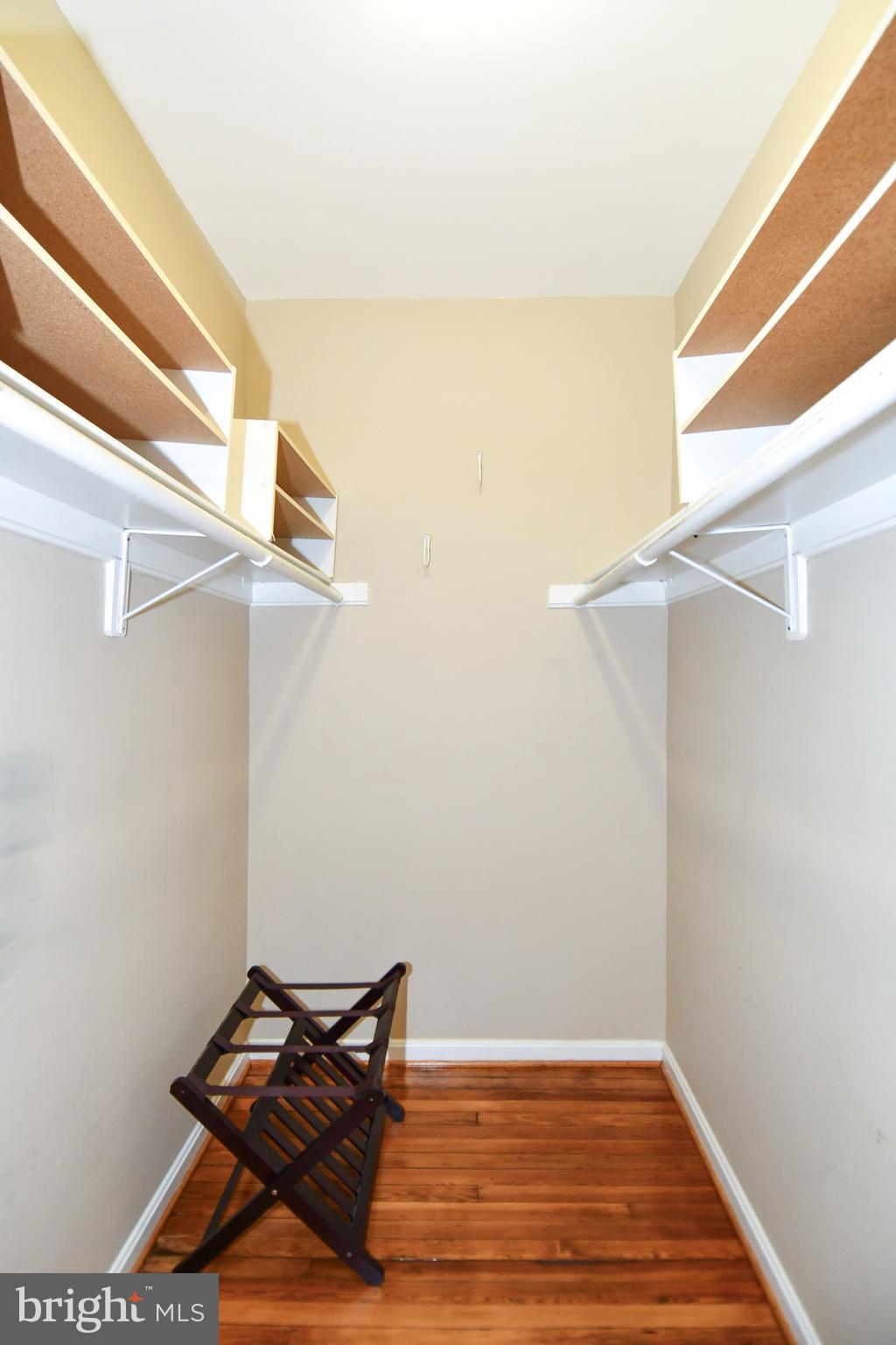 11 R Street Northwest Washington, DC 20001 - Photo 34 of 55 a view of a room with wooden floor and bench